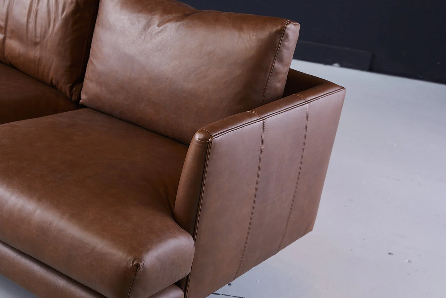 Duster 3 Seater Sofa Brown Armrest Closeup