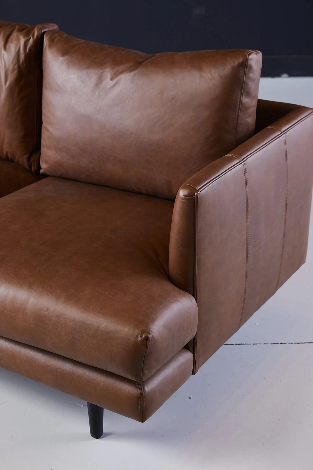 Duster 3 Seater Sofa Brown Leather Cushion Closeup