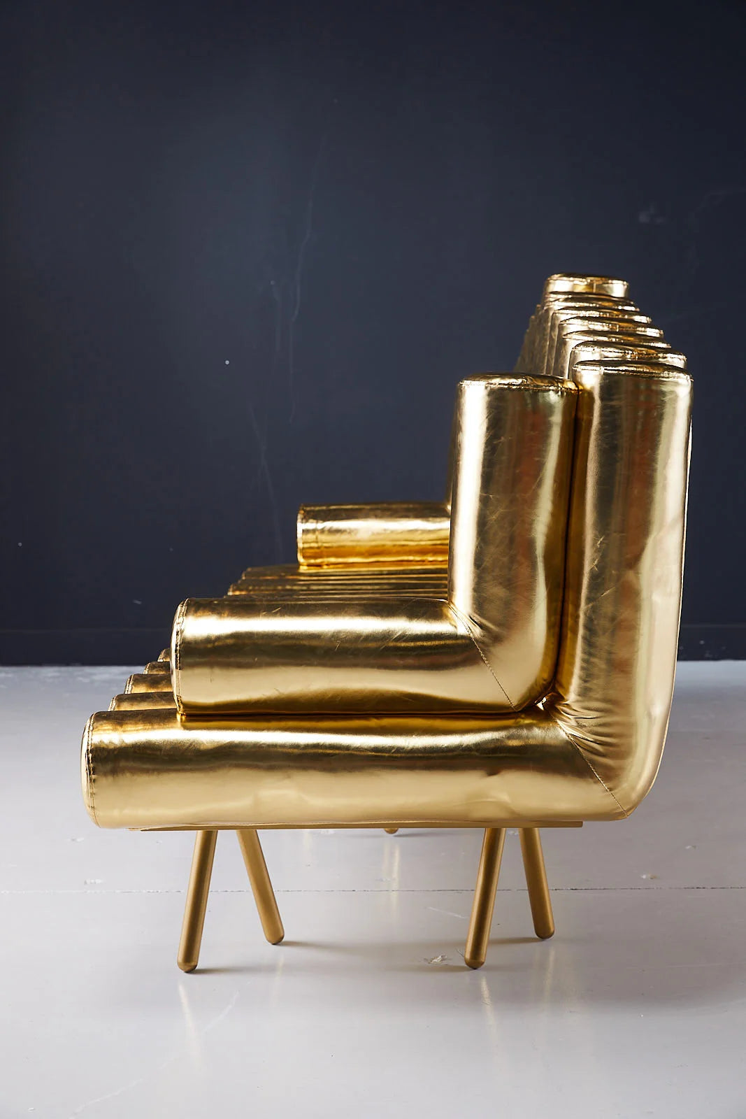 Elegant Cordelia Gold Sofa Side View