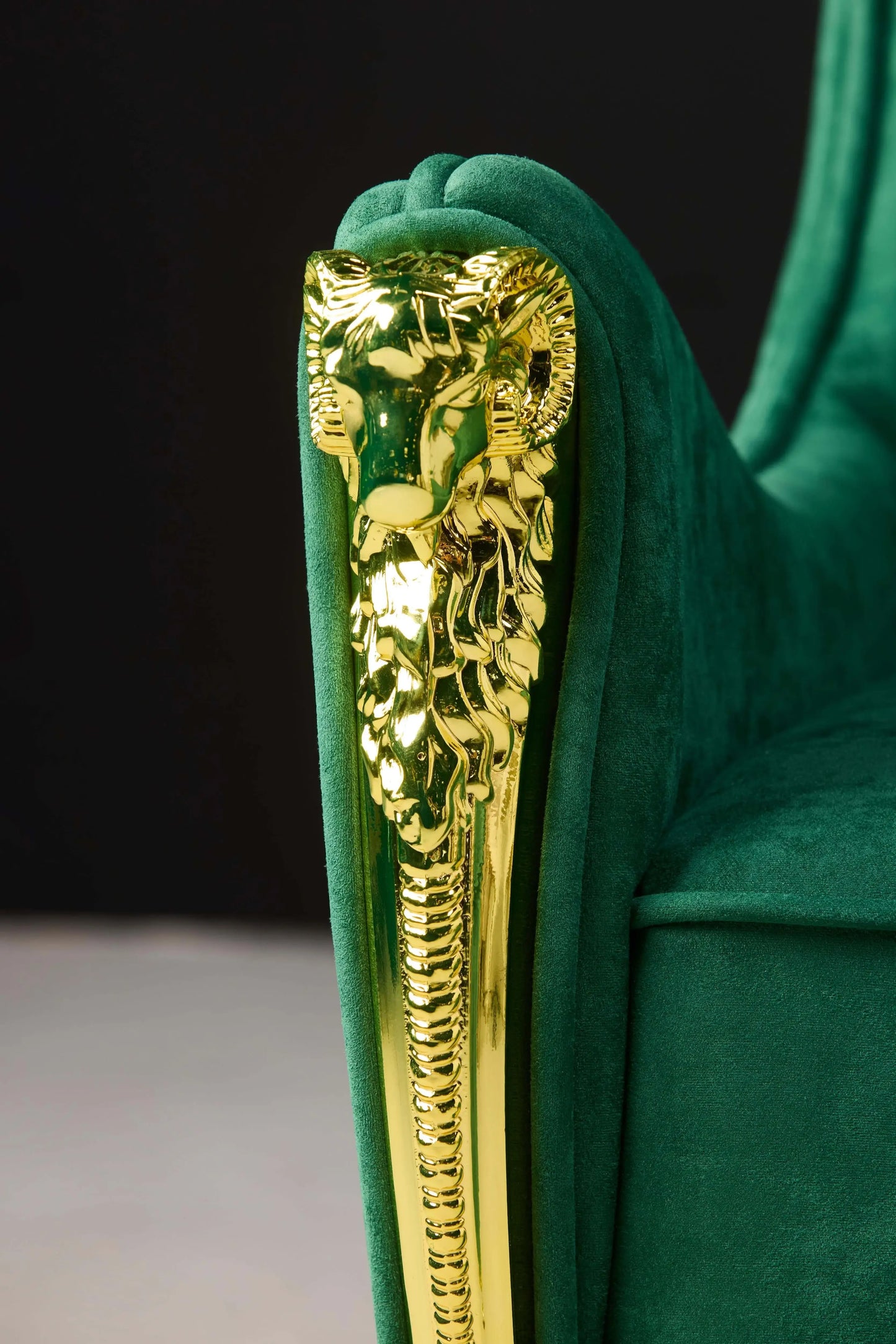 Green Crown Velvet Chair Golden Emblem Close-up