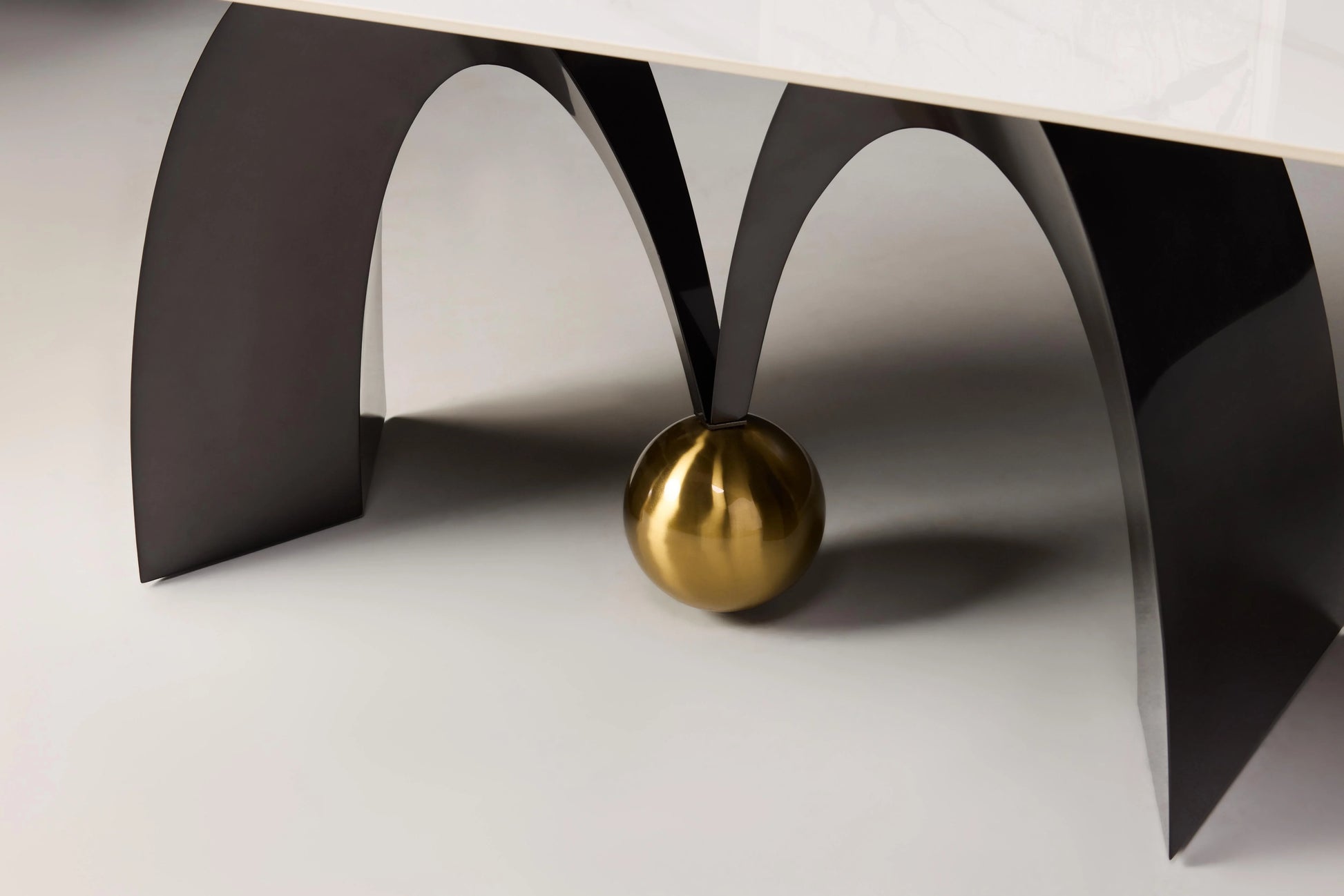 Luz 6-seater Dining Table - Close-up of Golden Ball Footer