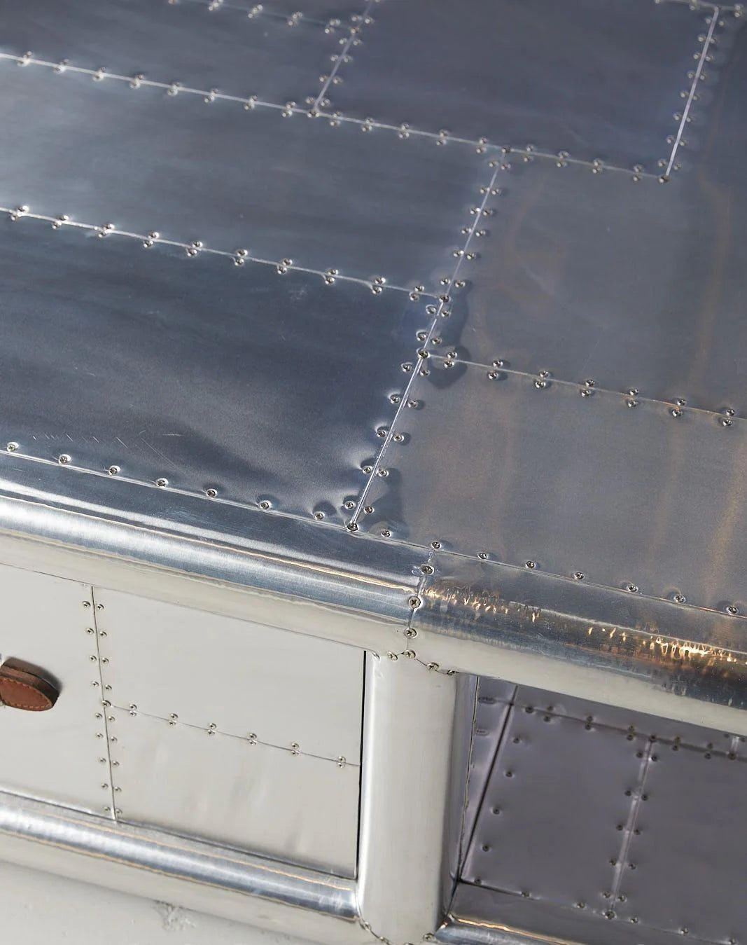 Vintage-style Silver Coffee Table - Metallic Surface Close-up