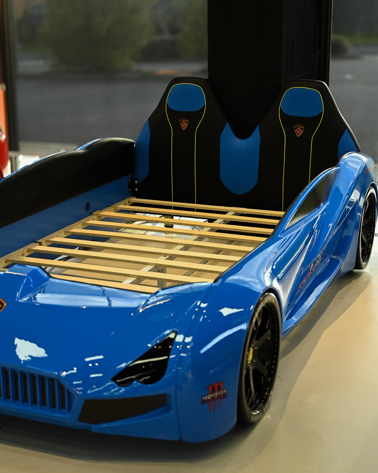 Blue kids race car bed