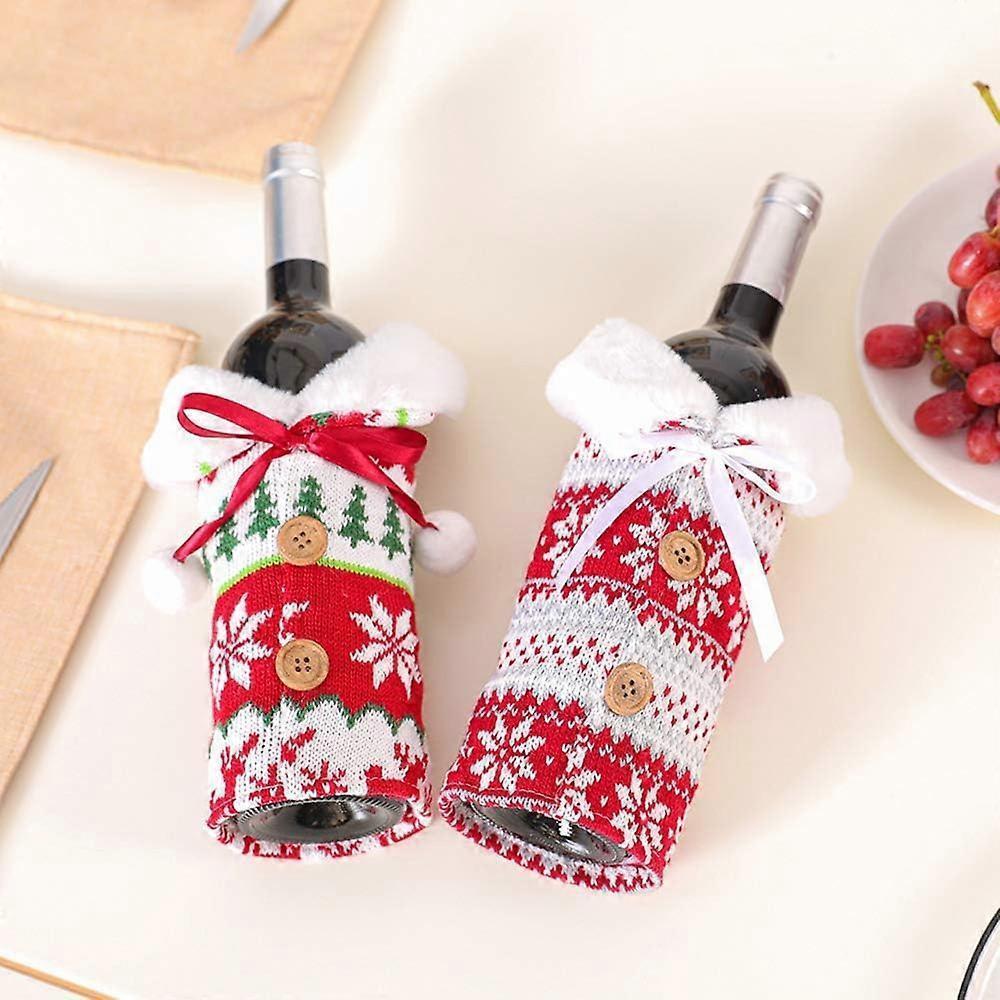 Wrap the knitted wine bottle sleeves with a faux fur collar for Christmas decorations