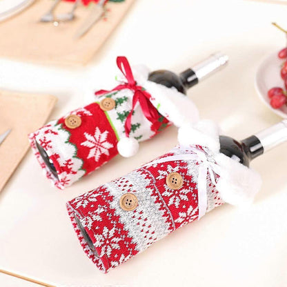 Wrap the knitted wine bottle sleeves with a faux fur collar for Christmas decorations