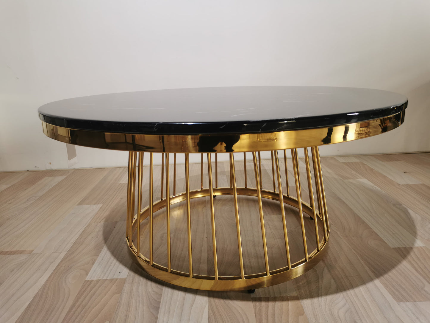 Black marble coffee table with gold legs